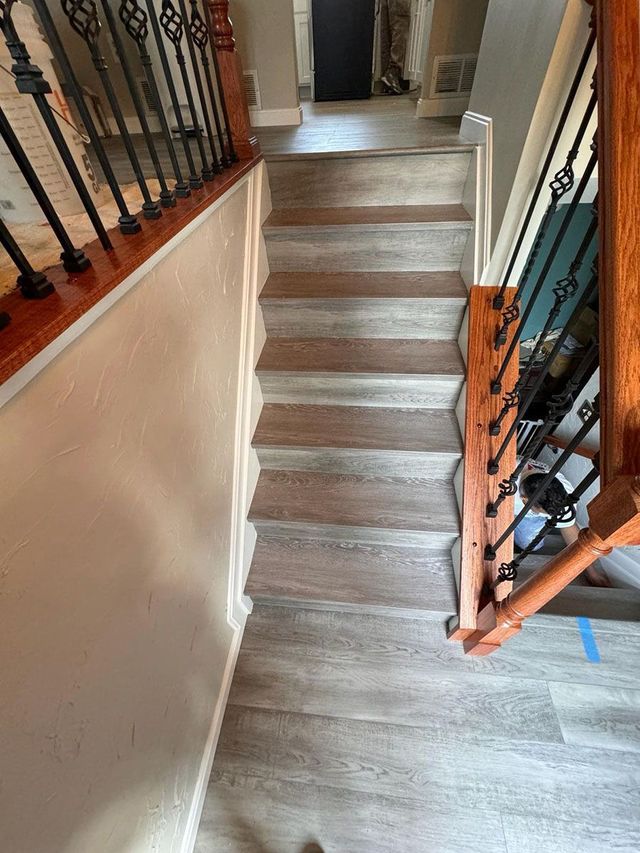 Stair treads and iron balusters installed, a Handyman on Demand project