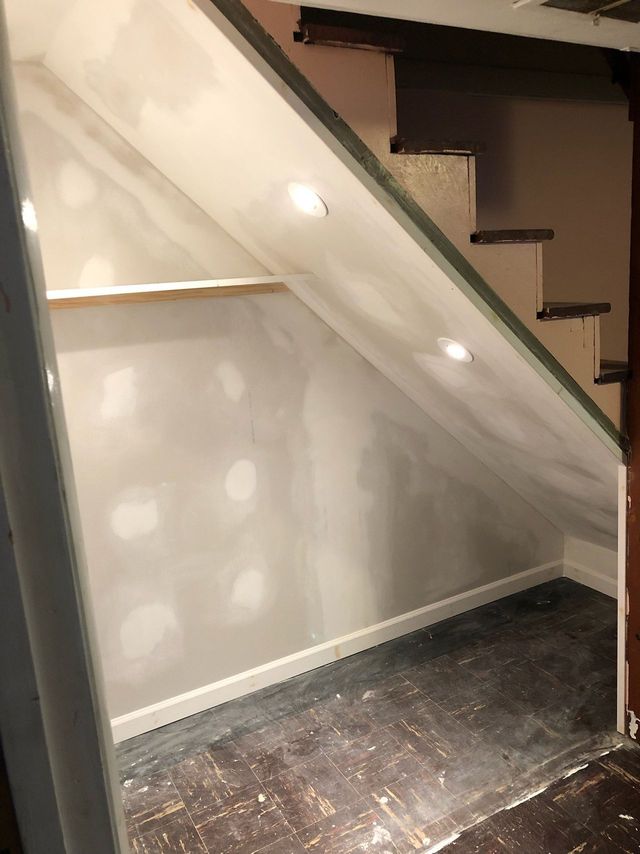 Under-stair storage closet framed, drywalled and lit, a Handyman on Demand project