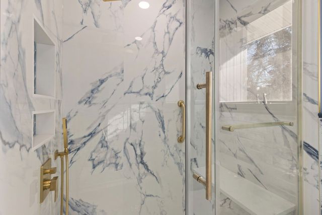 Marble walk-in shower with gold fixtures - Silver Spring, MD - Handyman on Demand