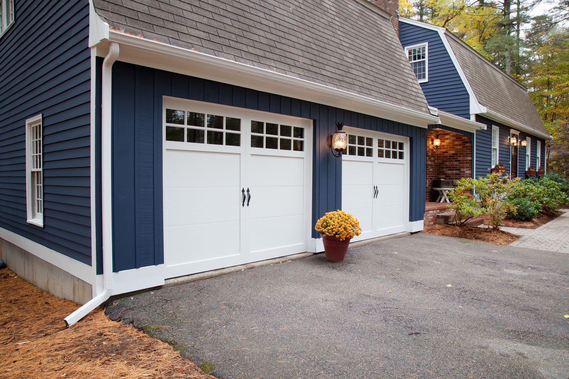 newly installed pristinely white garage doors