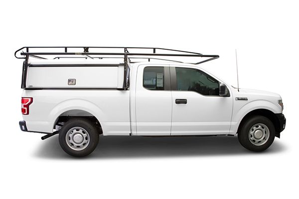 Holman ladder rack on a white work truck with commercial cap