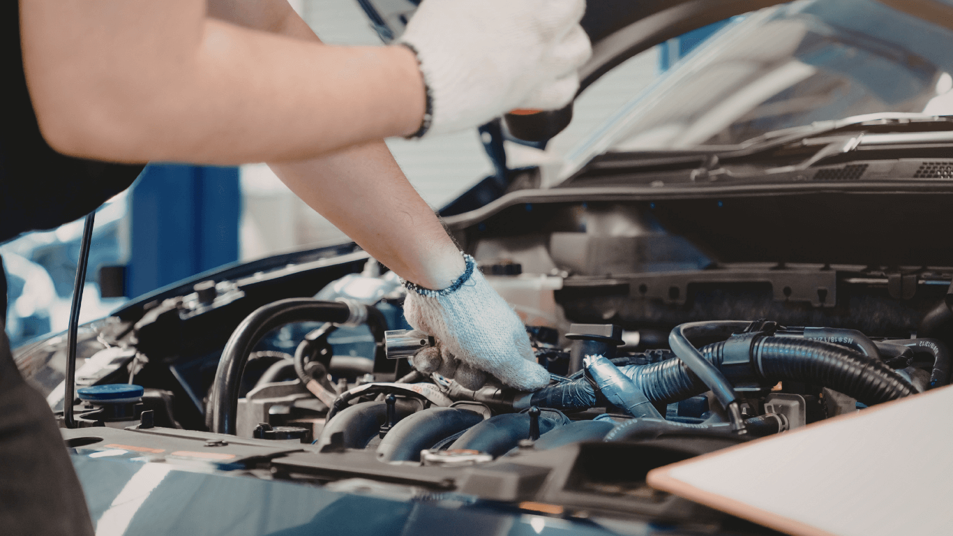 a mechanic doing an auto repair in Poinciana