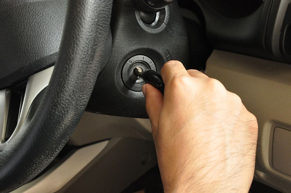A Person is Using a Key to Start a Car — JJ's Garage In South Geelong, VIC