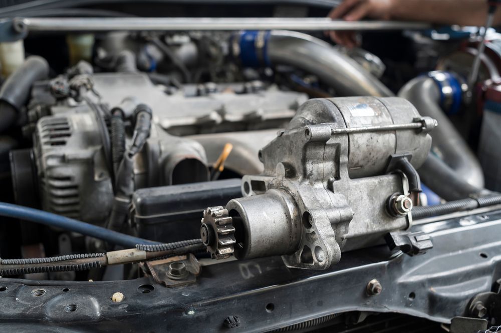 A Person is Working on the Engine of a Car — JJ's Garage In South Geelong, VIC