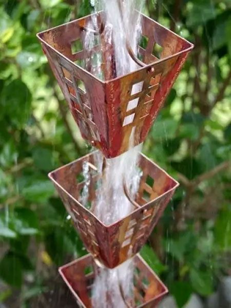 Downspouts And Rain Chains For Your Seamless Gutters!