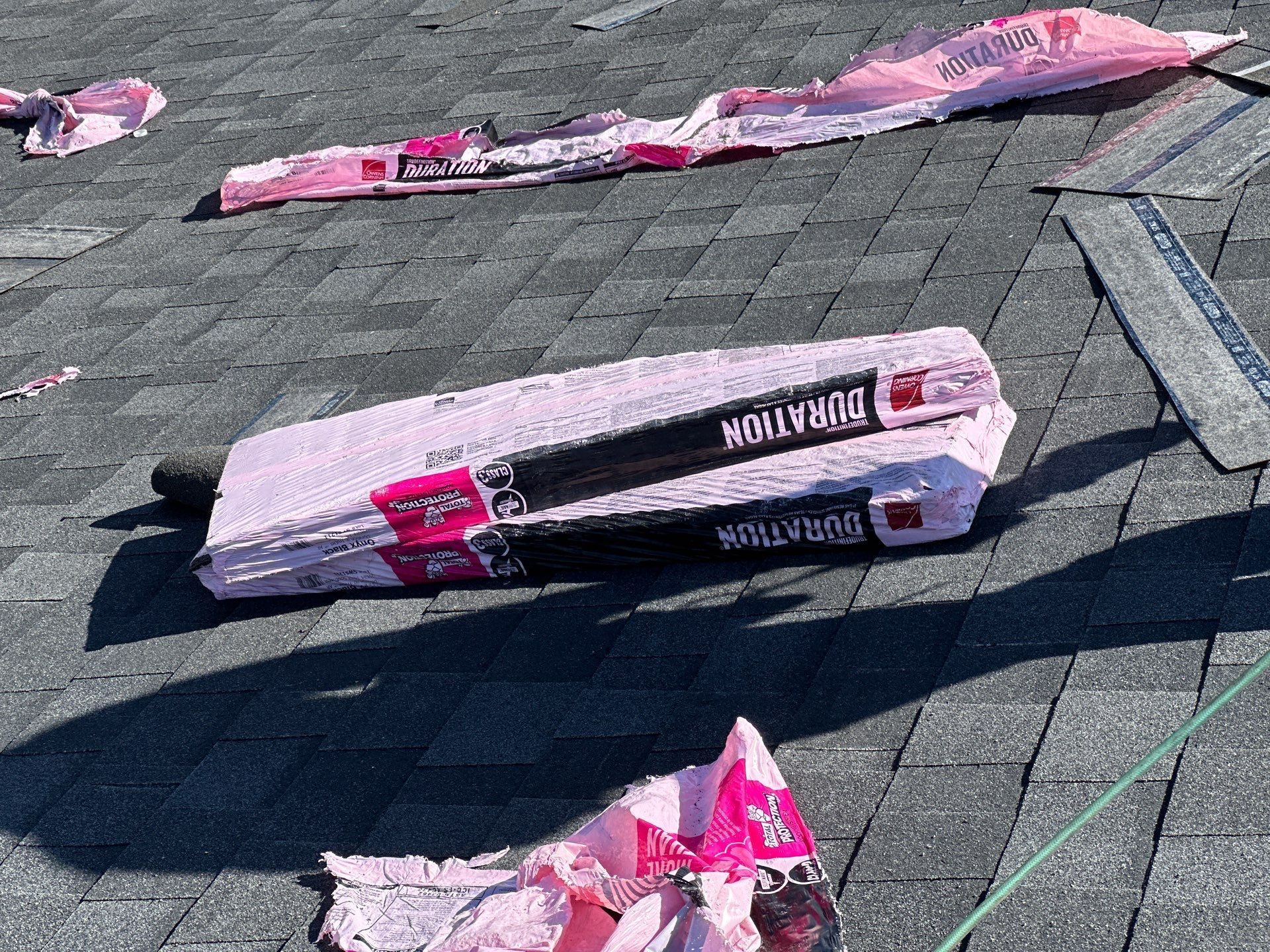 Pink roofing material labeled 