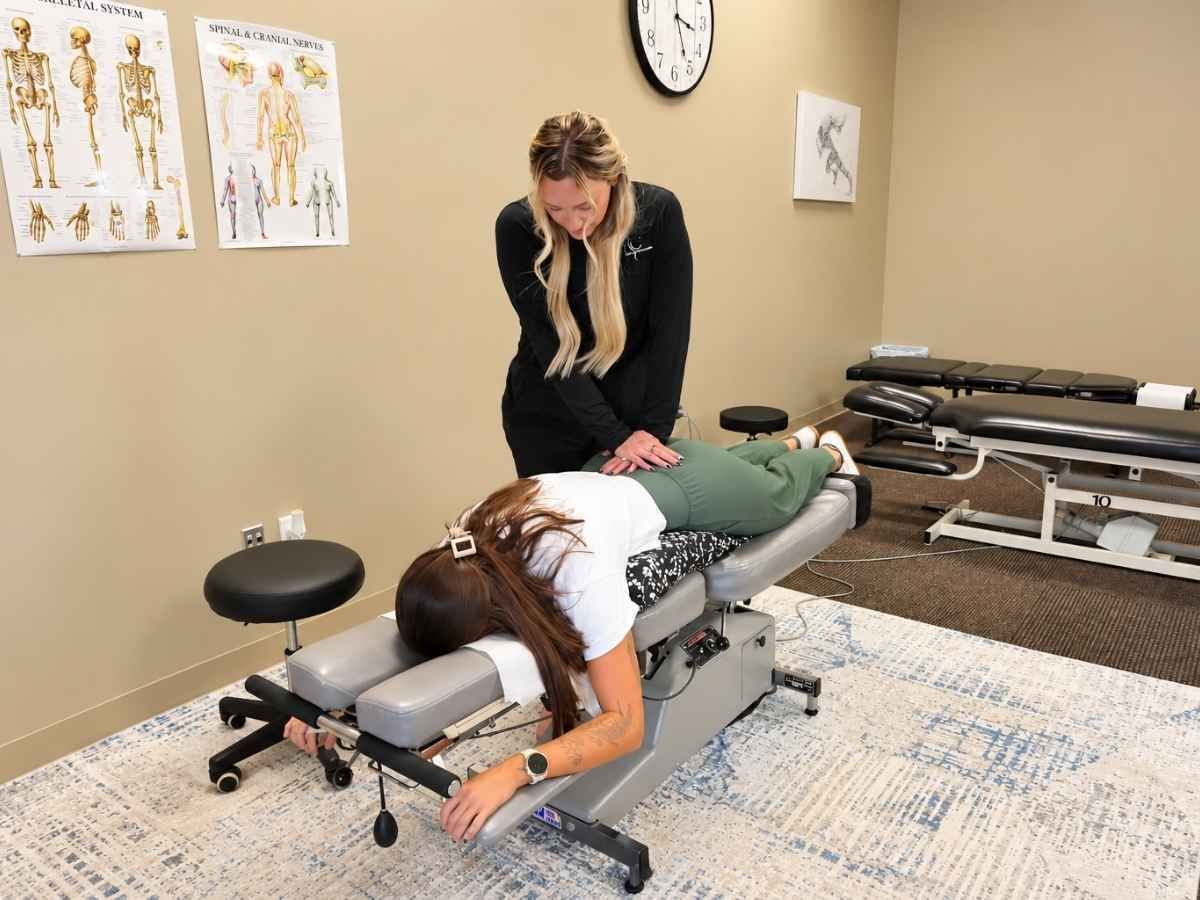 Chiropractic adjustment for a patient with sciatica at Raise Chiropractic in Littleton, Colorado