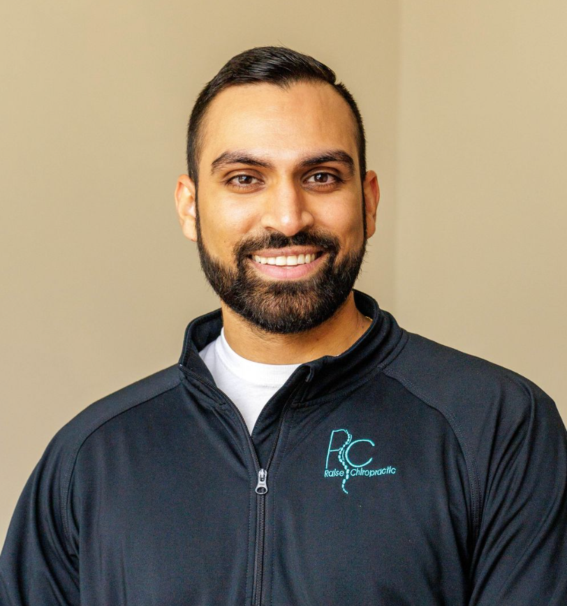Dr. Neal Surani the owner and chiropractor at Raise Chiropractic in Littleton, CO.