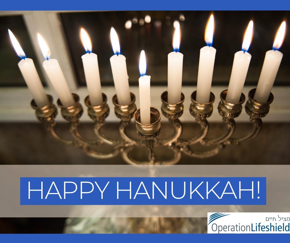 A picture of a menorah with the words happy hanukkah
