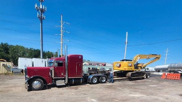 Tanker truck transporting industrial organic material