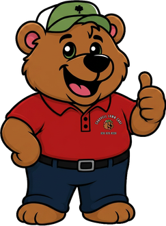Brown bear wearing a green hat with a shamrock, smiling.