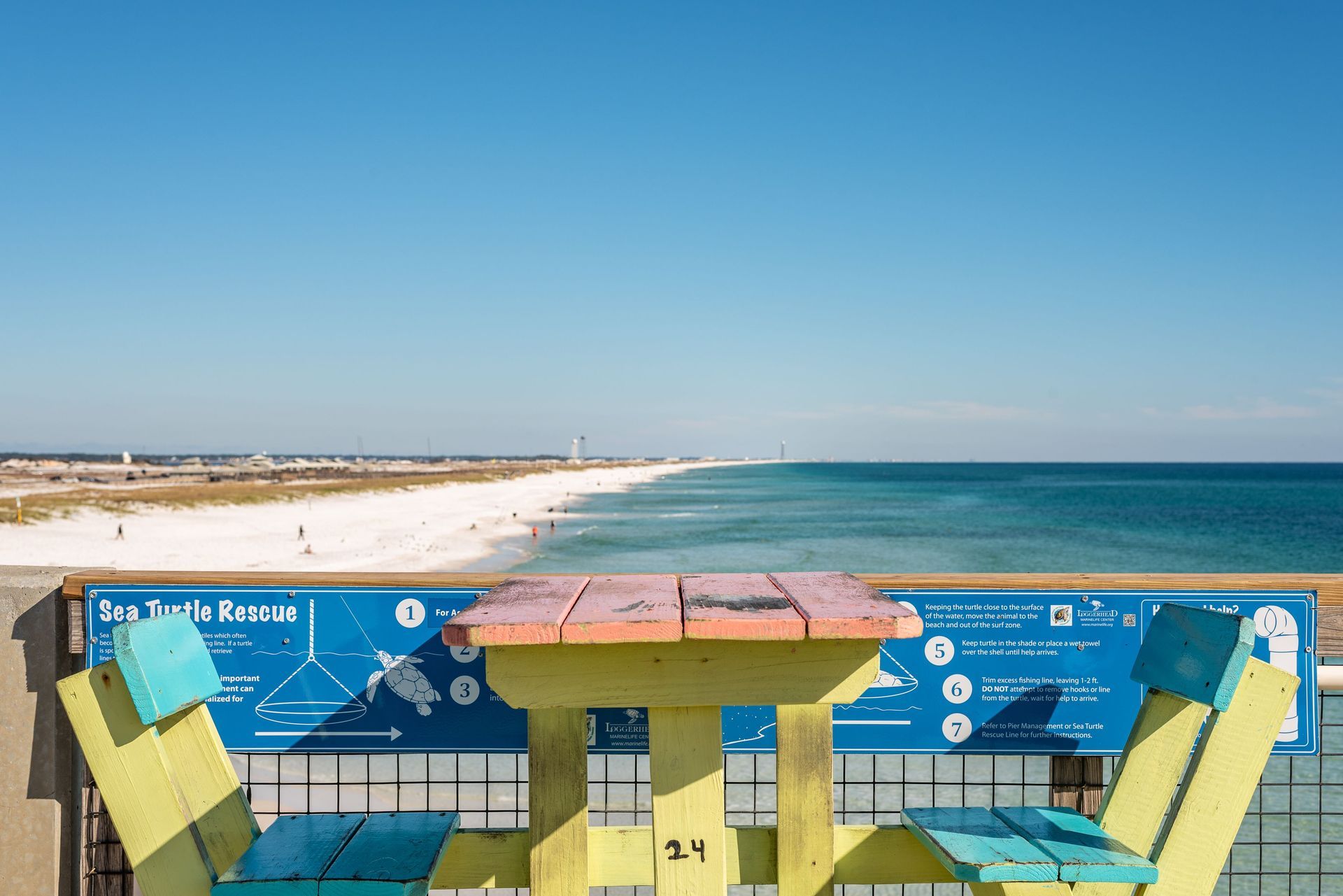 Colorful picnic table on the Navarre Beach pier overlooking the Gulf, Navarre Beach, Santa Rosa County, FL