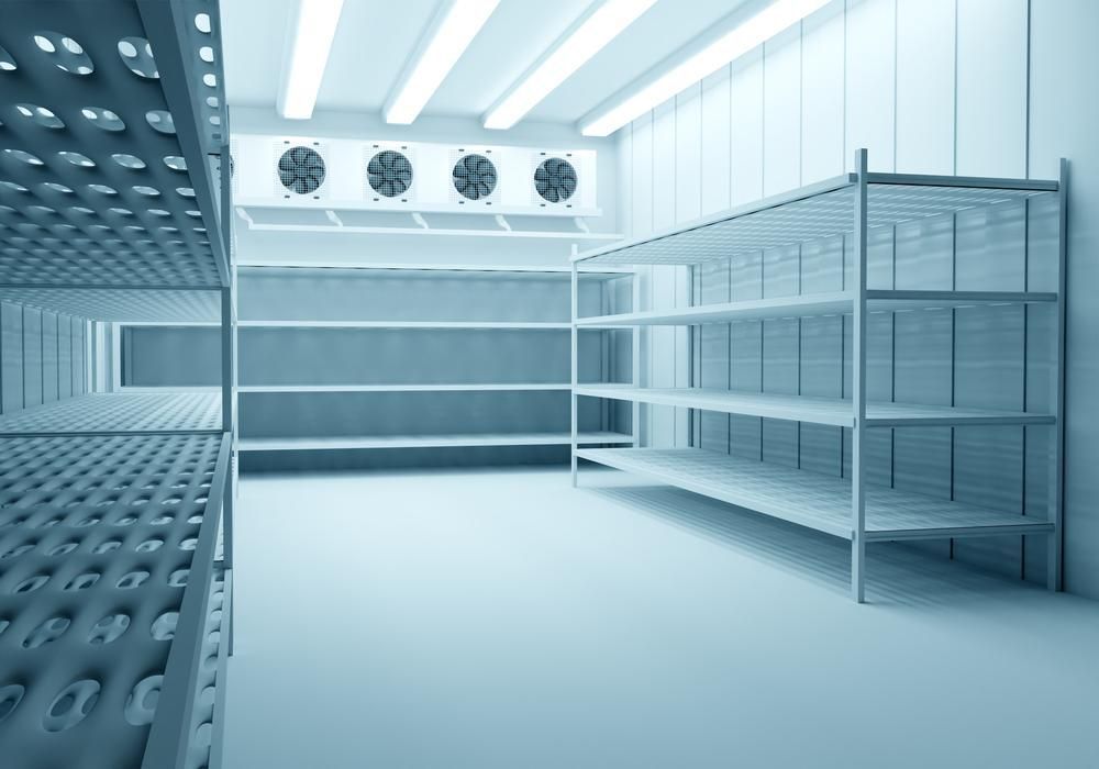 Empty Industrial Freezer With Metal Shelving and Ventilation Fans — Active Airconz in Rural & Remote, NT