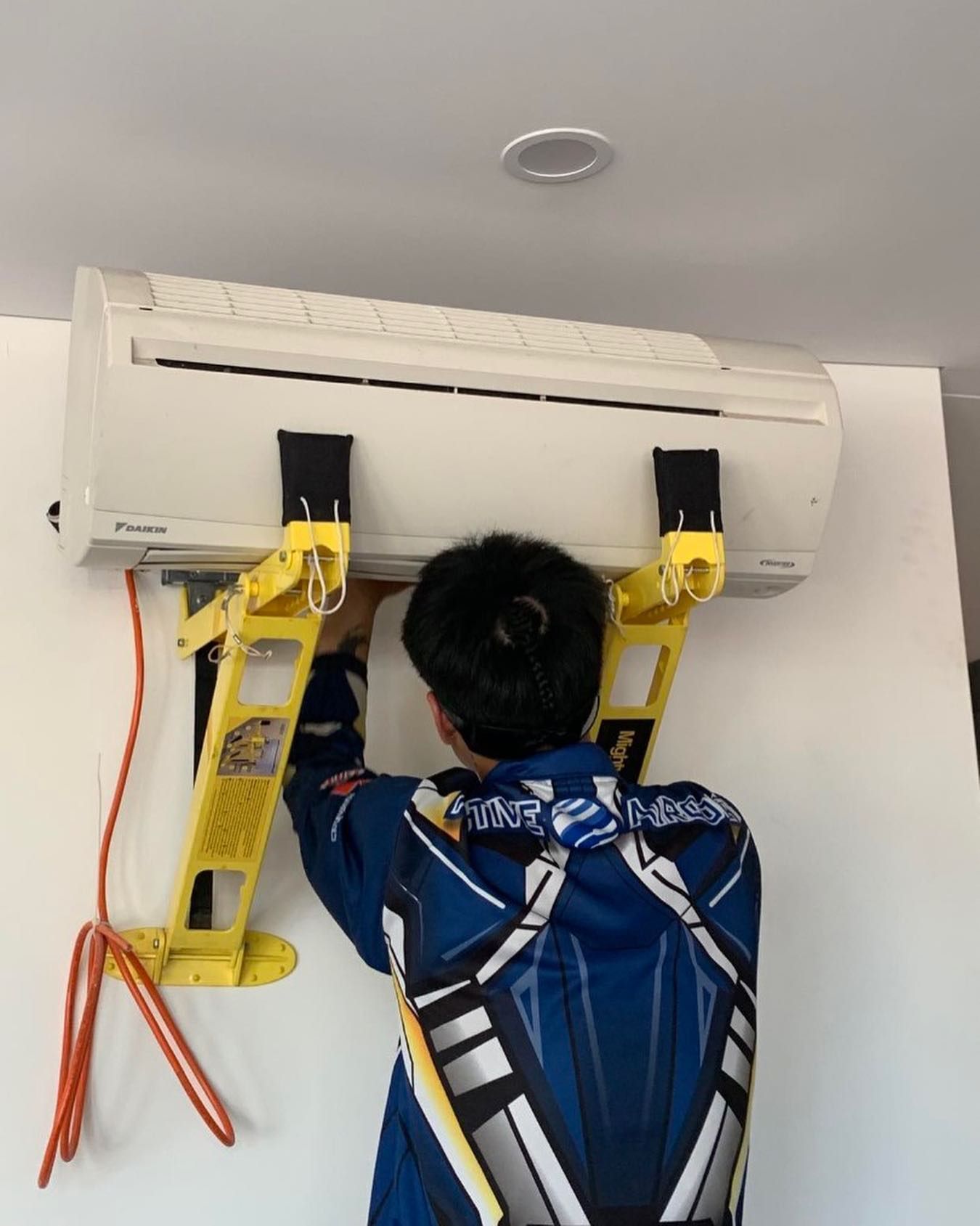 Person in Blue Jumpsuit Working — Active Airconz in Winnellie, NT