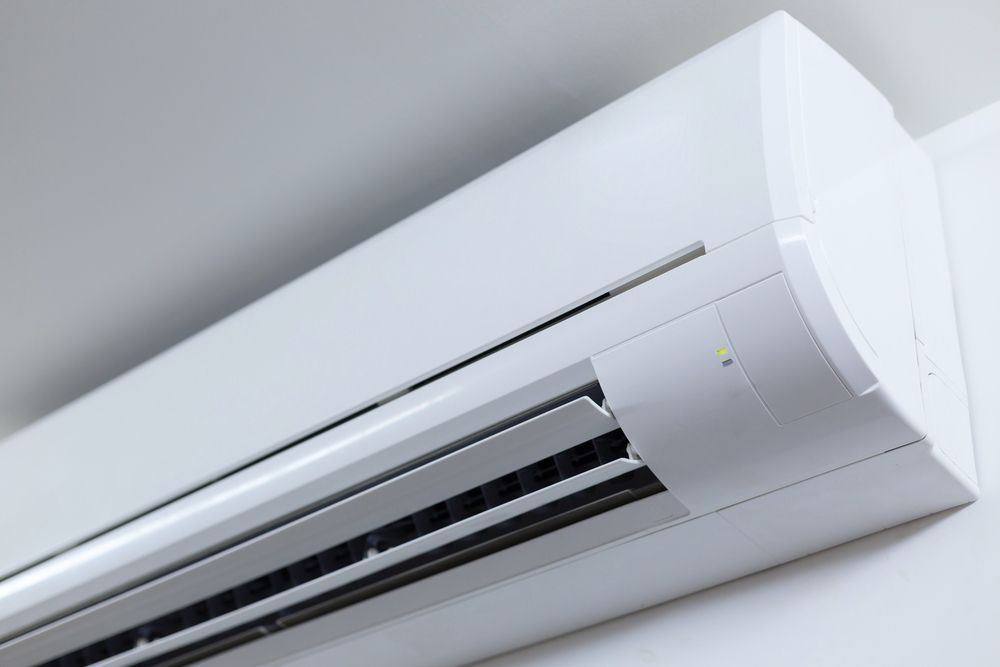 White Wall-mounted Air Conditioning Unit With Horizontal Louvres — Active Airconz in Tennant Creek, NT