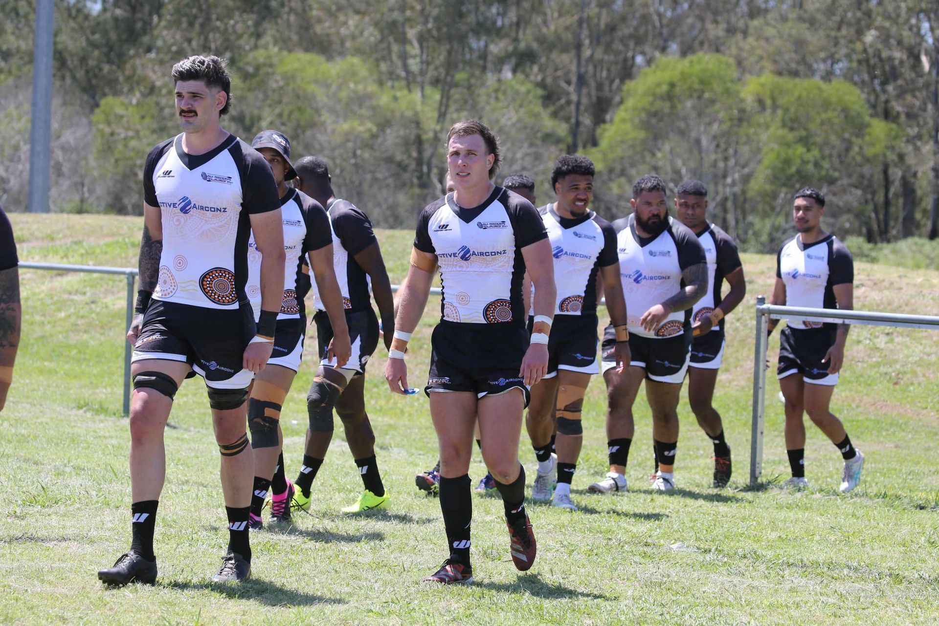Rugby Players in Black-and-white Uniforms — Active Airconz in Winnellie, NT