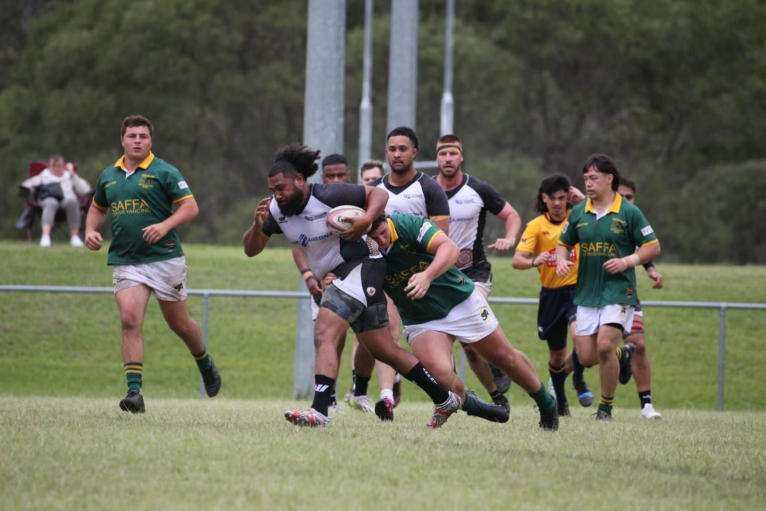 Rugby Players in Green and White Jerseys — Active Airconz in Winnellie, NT