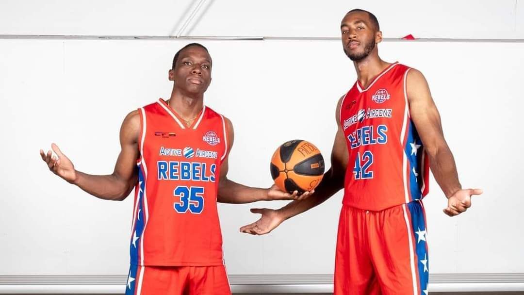 Two Basketball Players in Red Jerseys — Active Airconz in Winnellie, NT