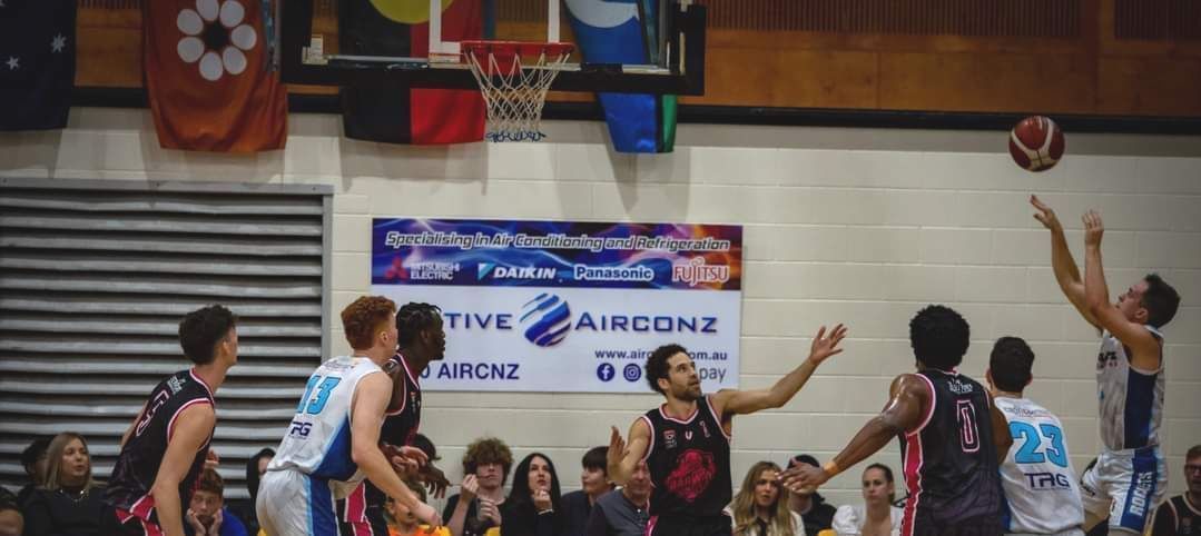 Basketball Game With Players Under the Hoop — Active Airconz in Winnellie, NT