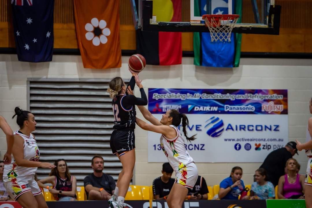 Basketball Player Leaps for a Shot — Active Airconz in Winnellie, NT