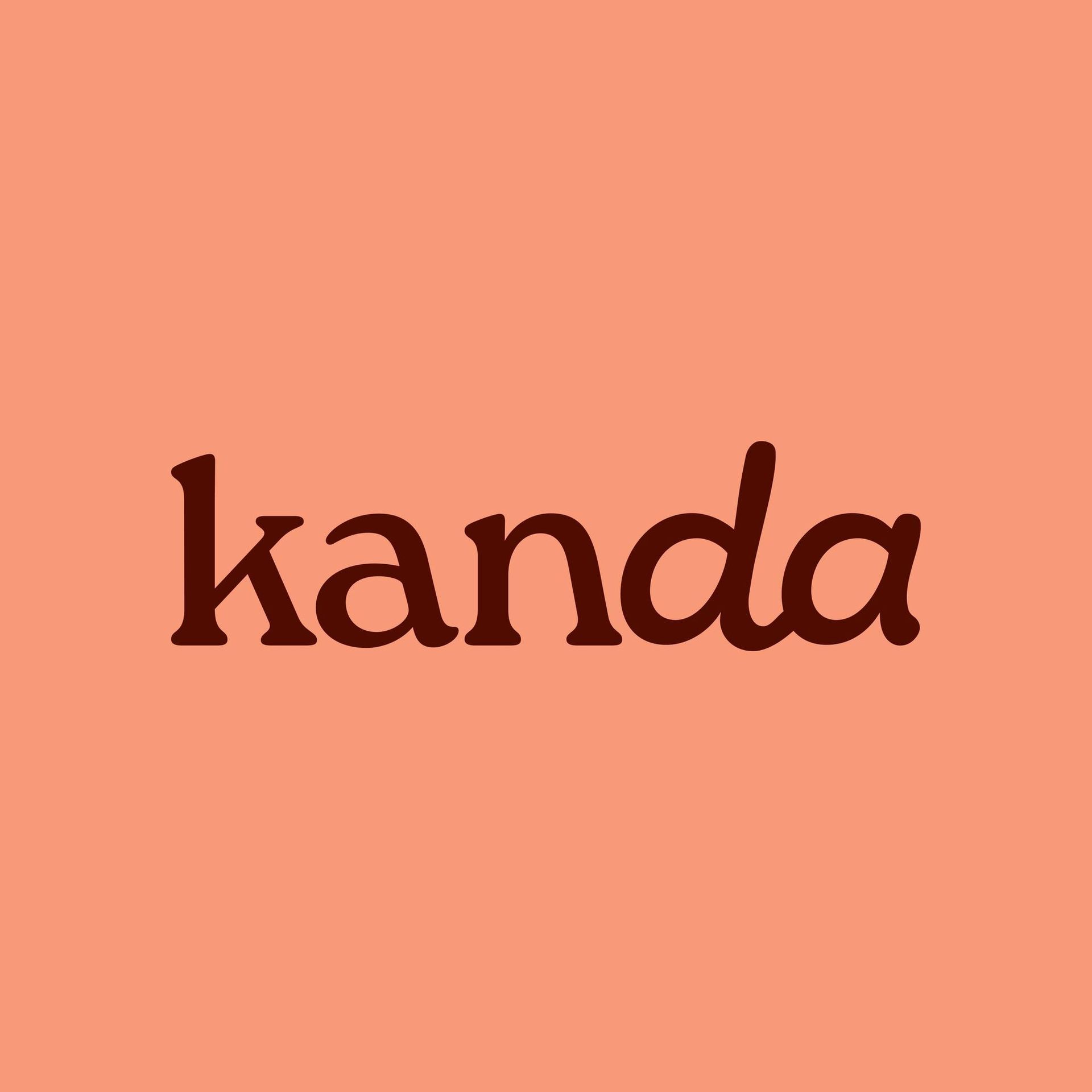 "Kanda" in dark brown script on a peach background.