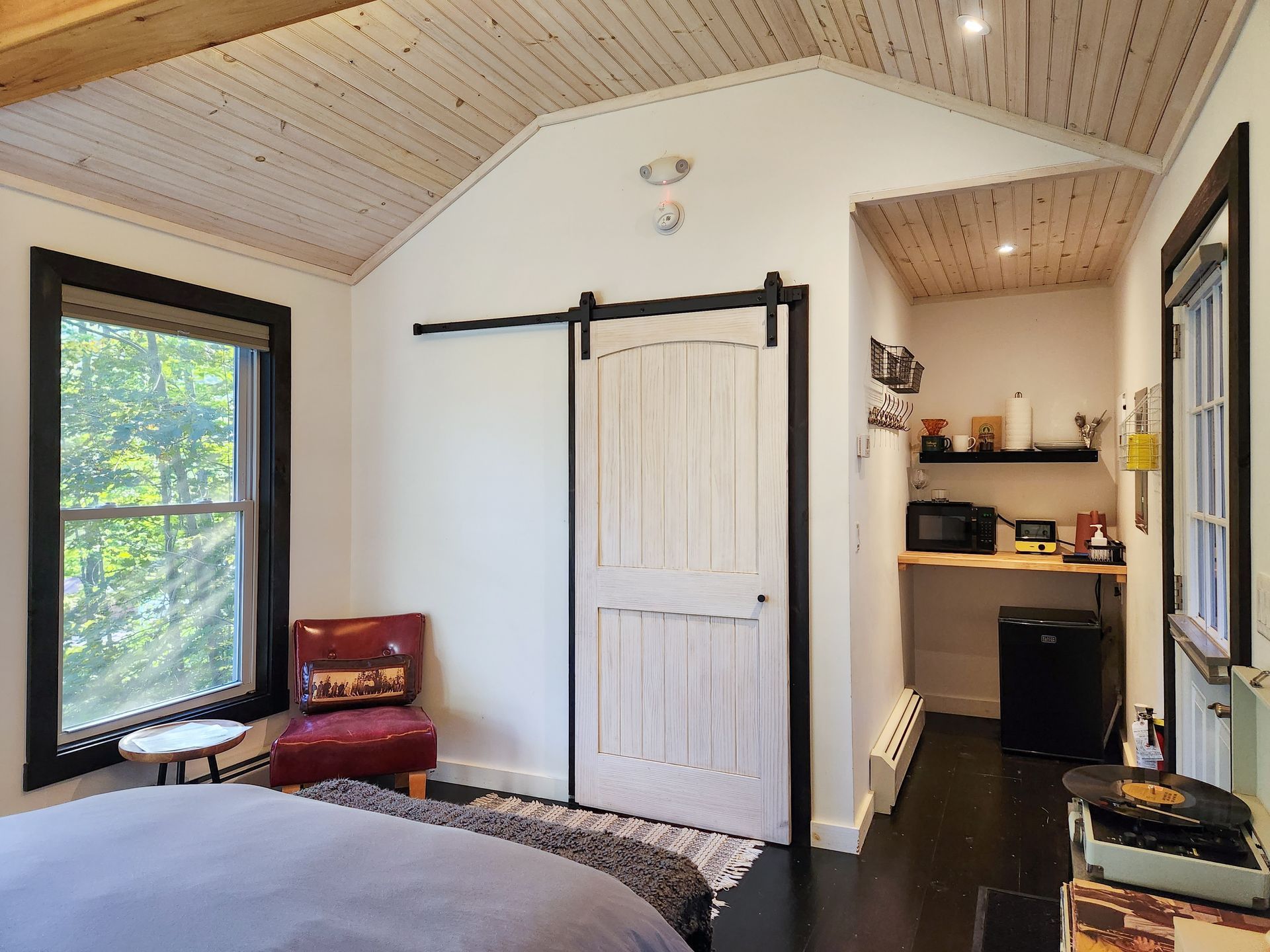 Interior of Belleayre Lodge's Cabin Number 1, in Pine Hill area of the Catskills, NY. Beautiful views and a cozy bedroom
