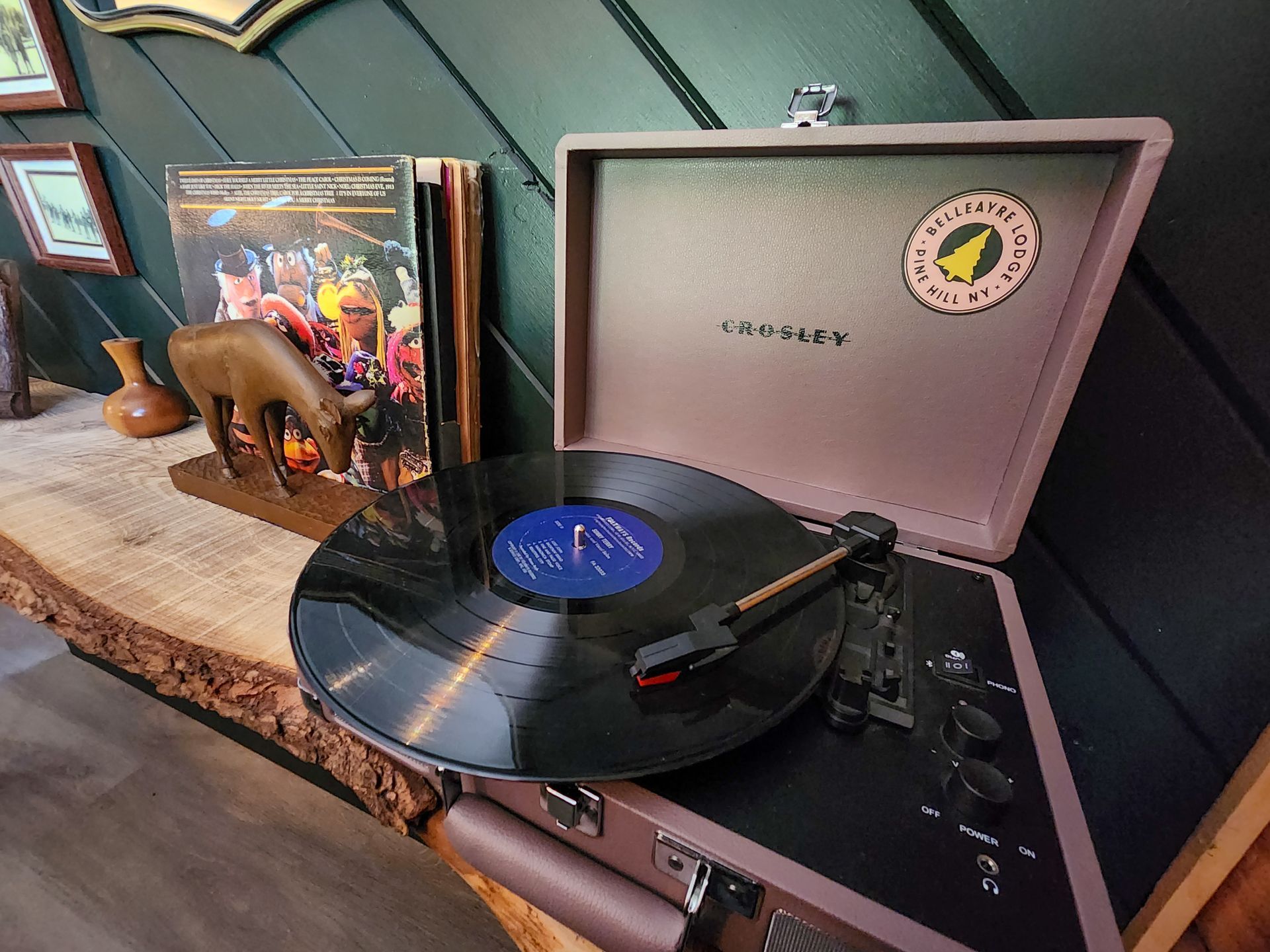 Closeup of Belleayre Lodge Cabin #4 amenities: Crosley vintage-style turntable with a vinyl record inside.