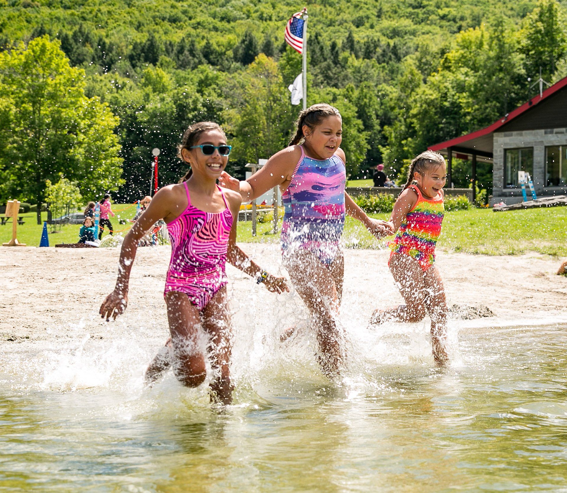 Photo of kids playing in a lake.