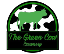 The Green Cow Creamery logo with a green cow on a black-and-white cowhide circle