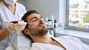 A woman is getting a botox injection in her face.
