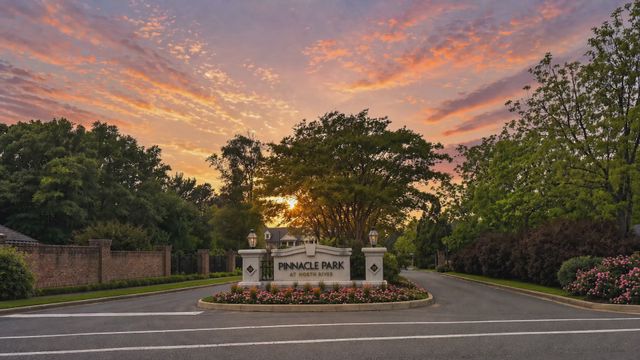 Pinnacle Park at Northriver gated entrance at sunset