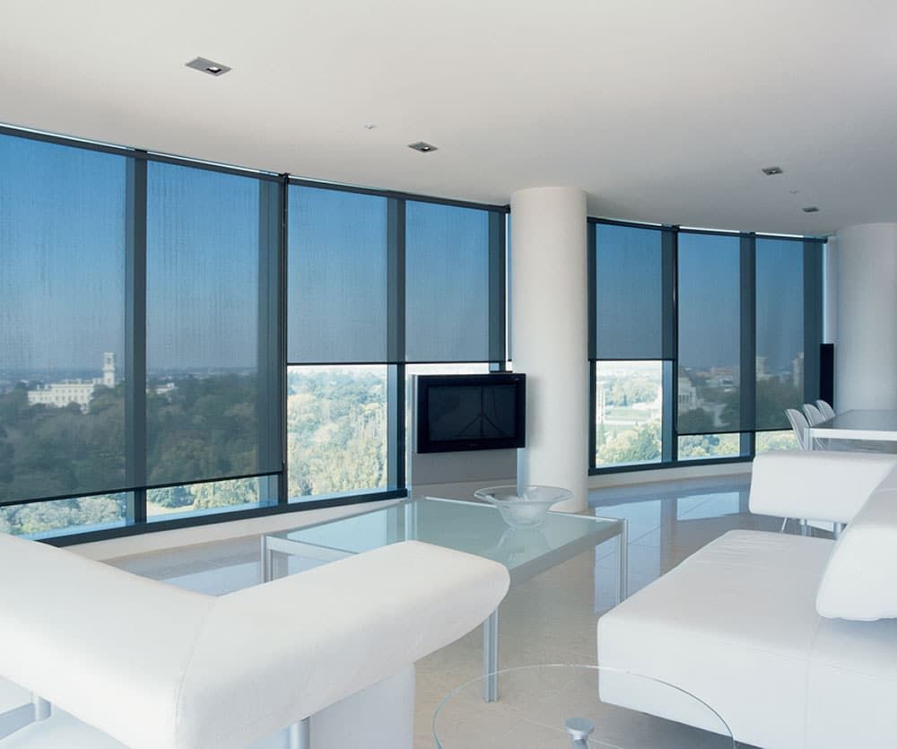 Black Translucent Blinds in Wide Hall — Blinds in Bogangar, NSW