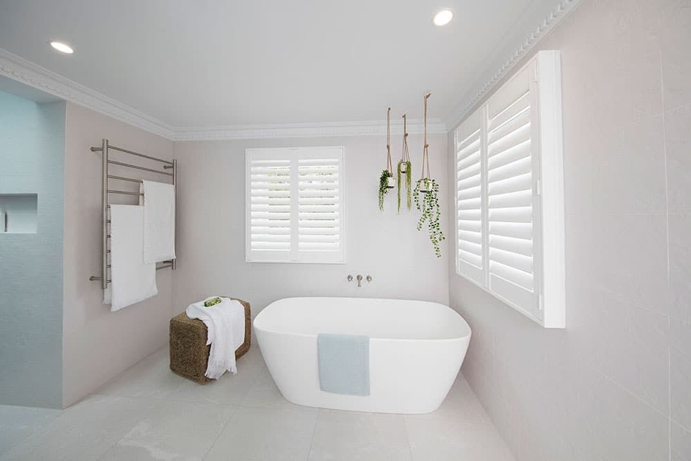 Poly Satin Shutters Enhance Bathroom Ambiance — Blinds in Bogangar, NSW