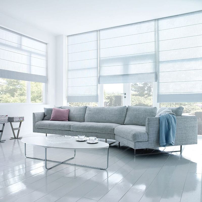 White Roman Blinds in Elegant Sitting Room — Blinds in Bogangar, NSW