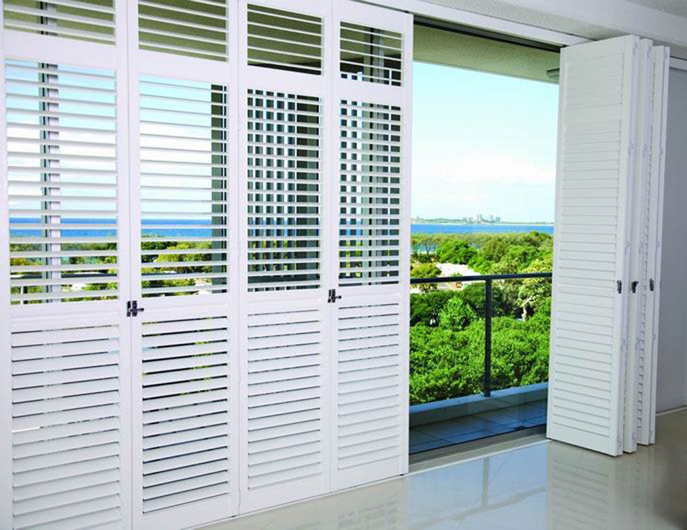 White Aluminium Shutters Bifold — Blinds in Bogangar, NSW