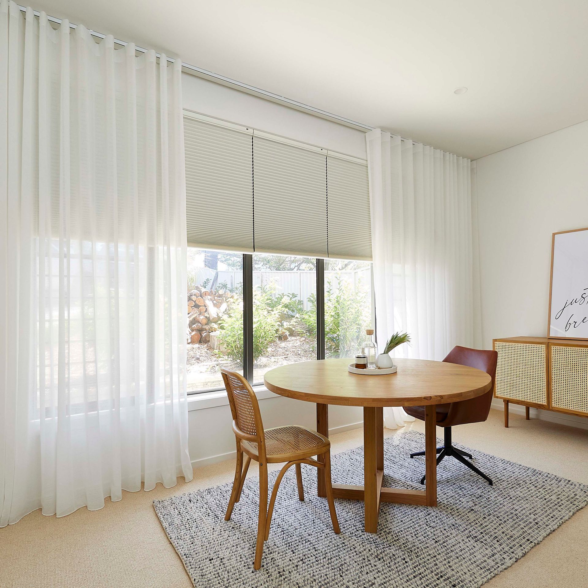 rolling blinds with white curtains