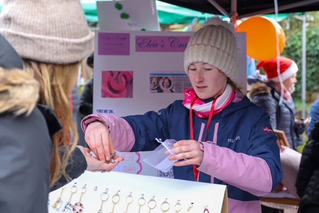 a girl selling art
