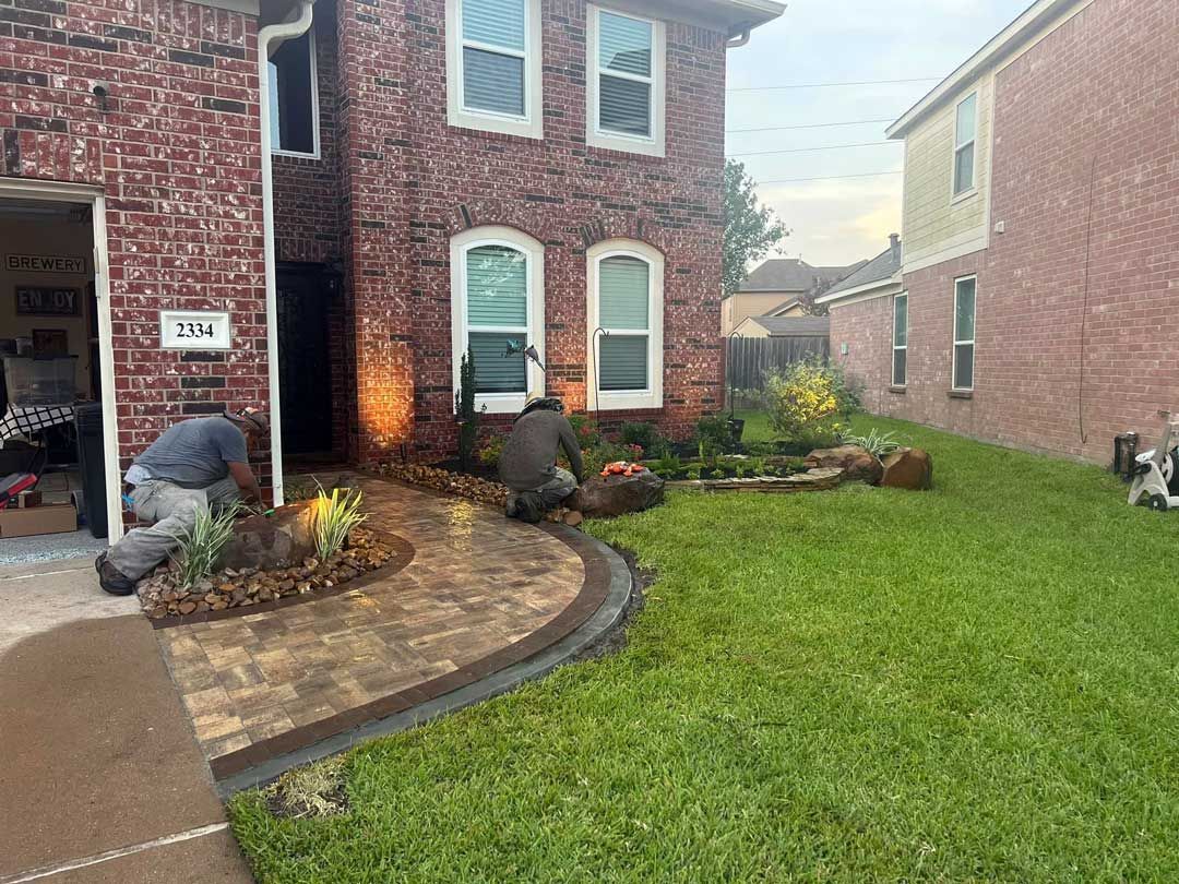 Final touches to a landscaping bed