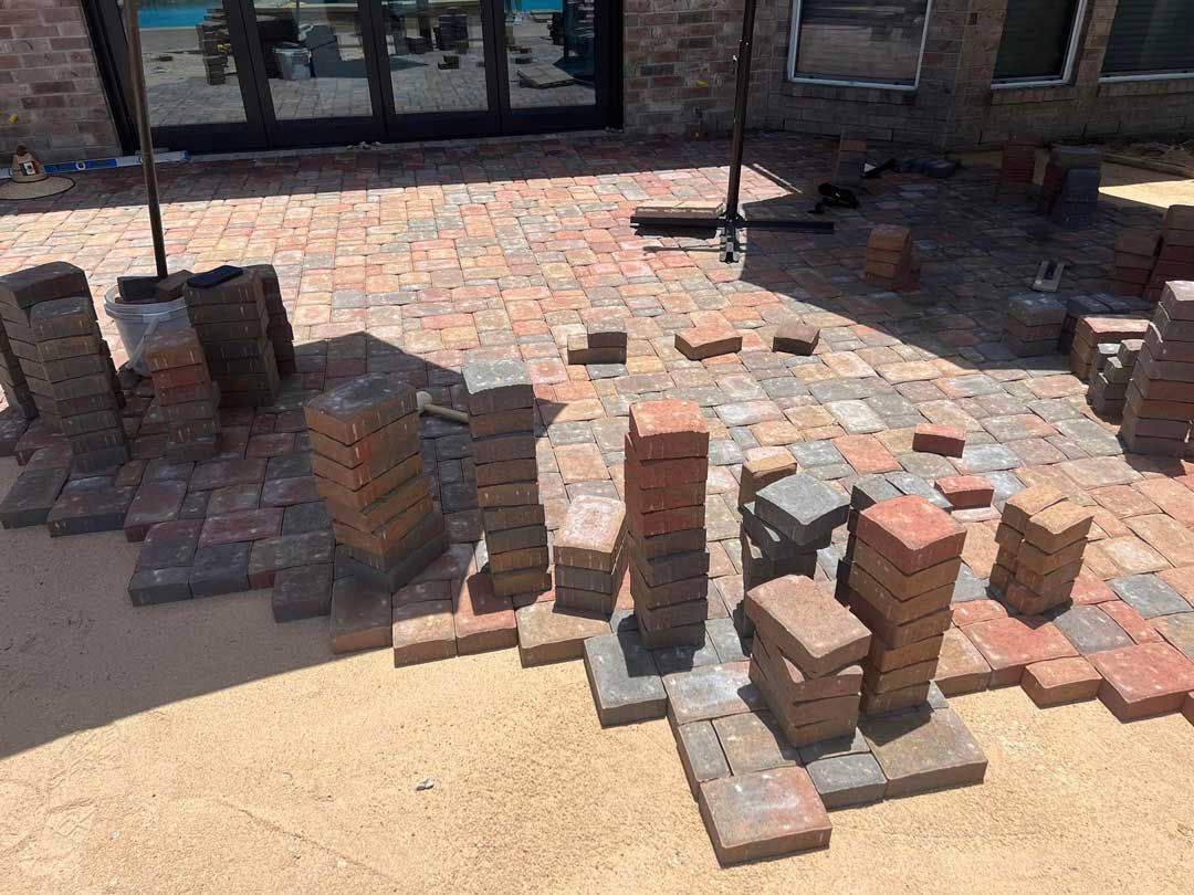 Site preparation and paver patio construction