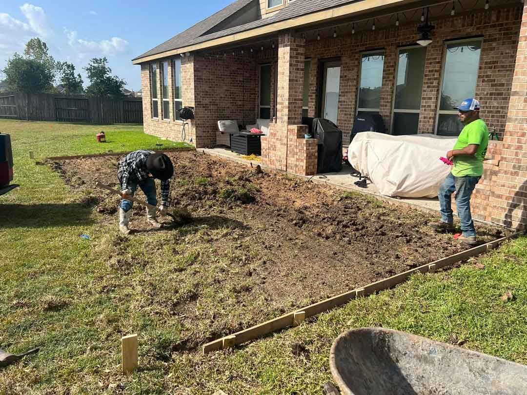 Site preparation for a concrete base for a paver patio