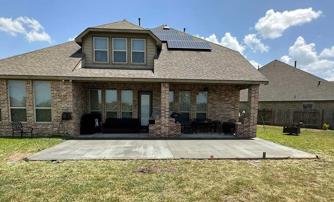 Concrete base for a backyard paver patio