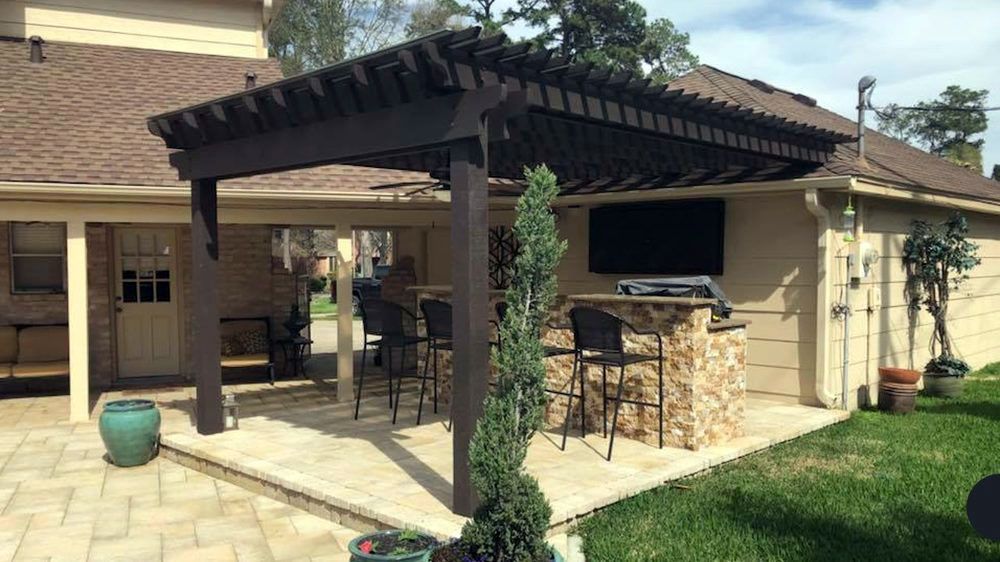 Outdoor custom kitchen with pergola