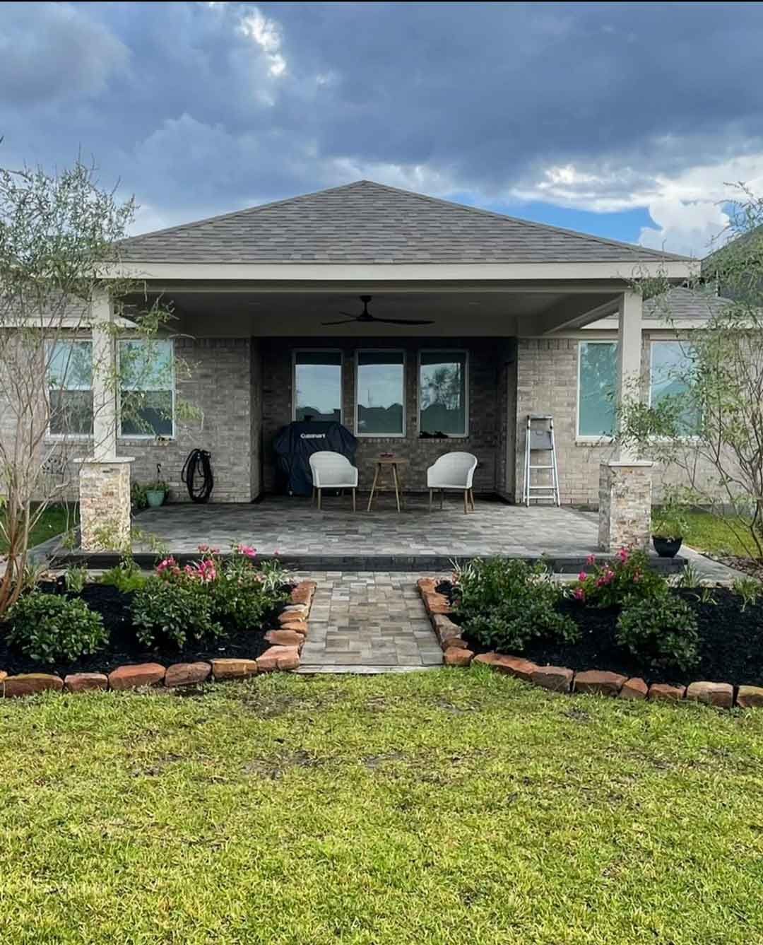 Backyard landscaping design and covered patio