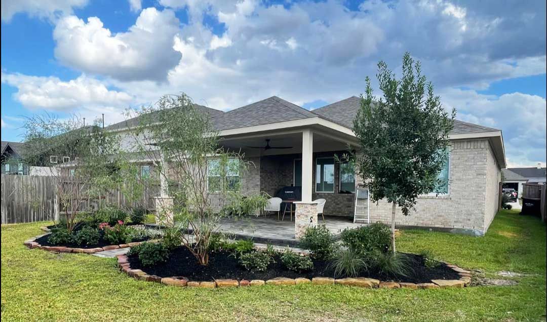 Landscaping with plants and flowers in a backyard