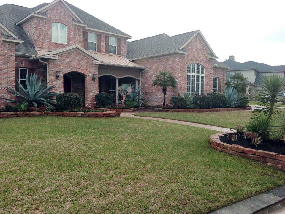 Landscaping stone beds with plants and shrubs