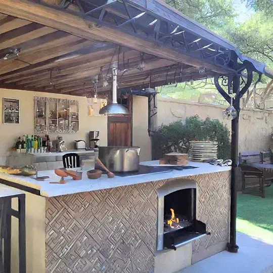 A beautiful mediterranean style outdoor kitchen