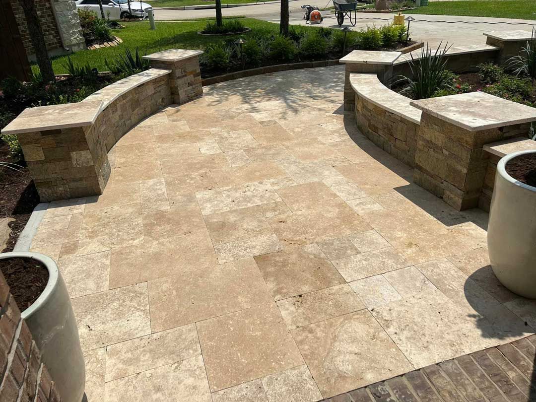 Wide glossy limestone pathway with small walls on the sides