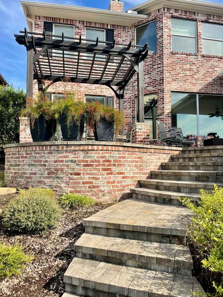 Timber dark cedar pergola on terrace hardscape structure