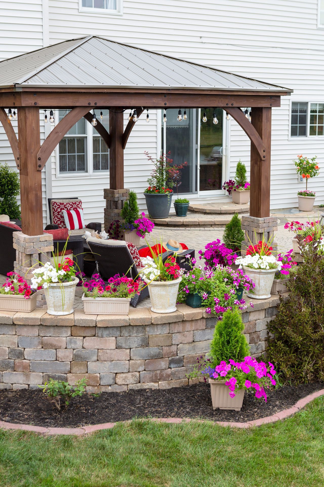 Gable Pergola in a beautiful patio with landscaping designs