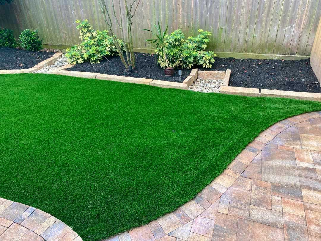 Artificial turf backyard landscape
